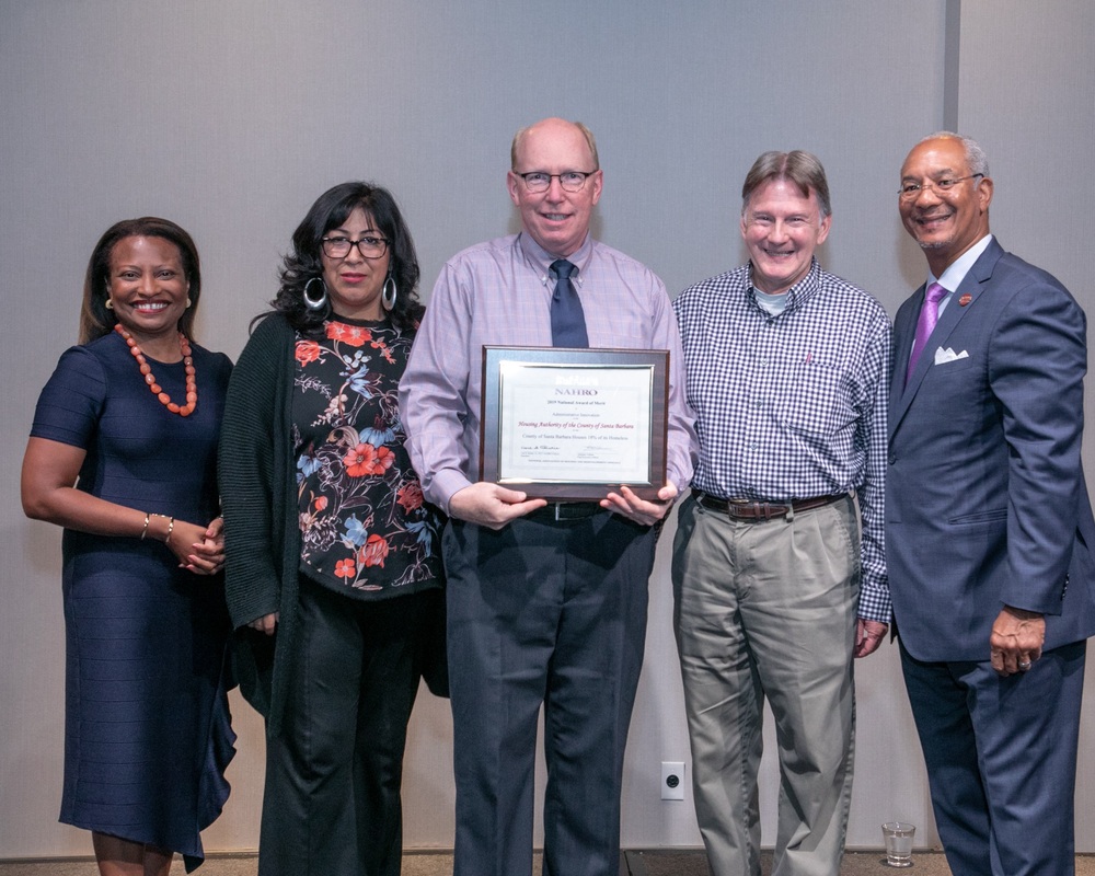 members of Santa Barbara Housing Authority accept award of merit