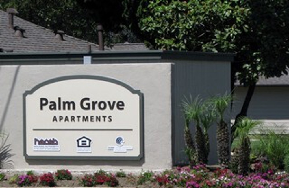 Palm Grove apartments sign
